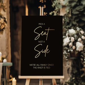 black and gold pick a seat not a side wedding sign
