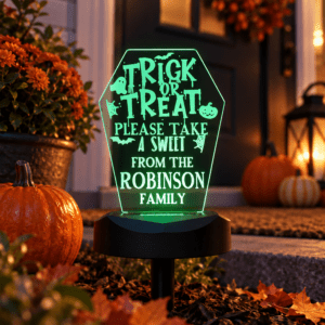 Personalised trick or treat solar light with colour-changing LED base and custom family name for Halloween porch or garden décor